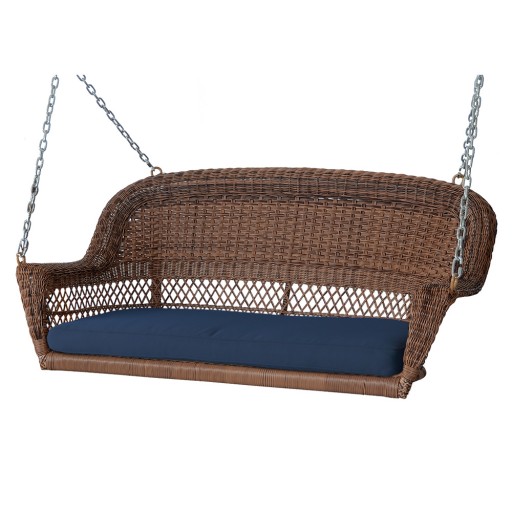 Honey Resin Wicker Porch Swing with Midnight Blue Cushion