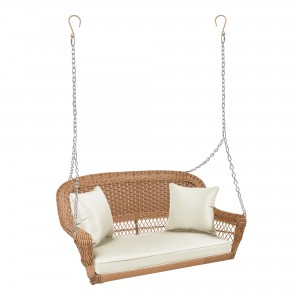 Honey Resin Wicker Porch Swing with Ivory Cushion