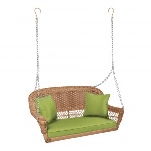 Honey Resin Wicker Porch Swing with Sage Green Cushion