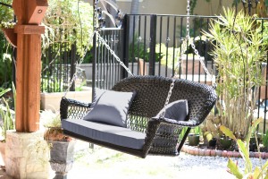 Black Resin Wicker Porch Swing with Steel Blue Cushion