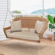 Honey Resin Wicker Porch Swing with Tan Cushion