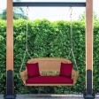 Honey Resin Wicker Porch Swing with Red Cushion